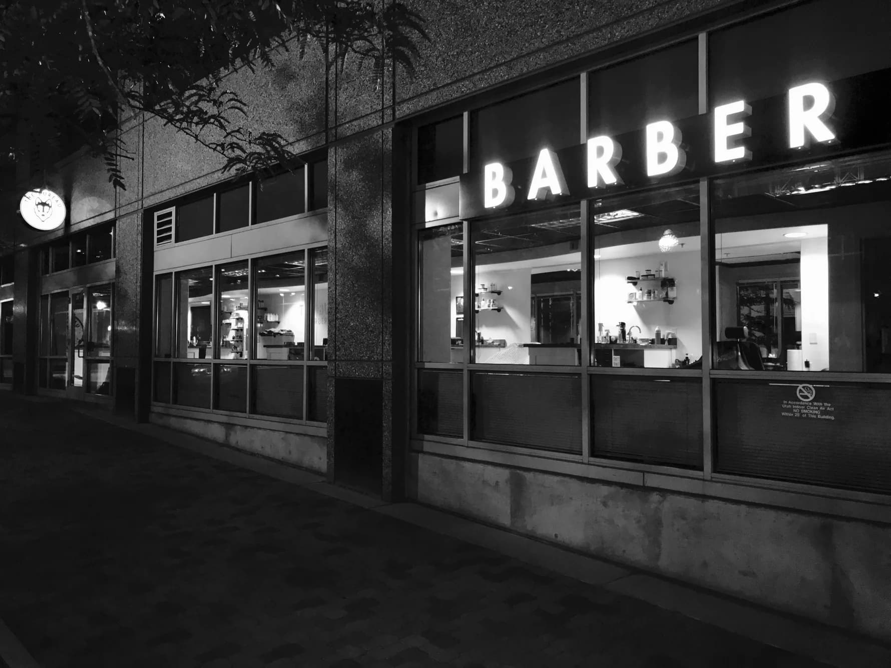 Street view of The Bureau Barbershop storefront in downtown SLC