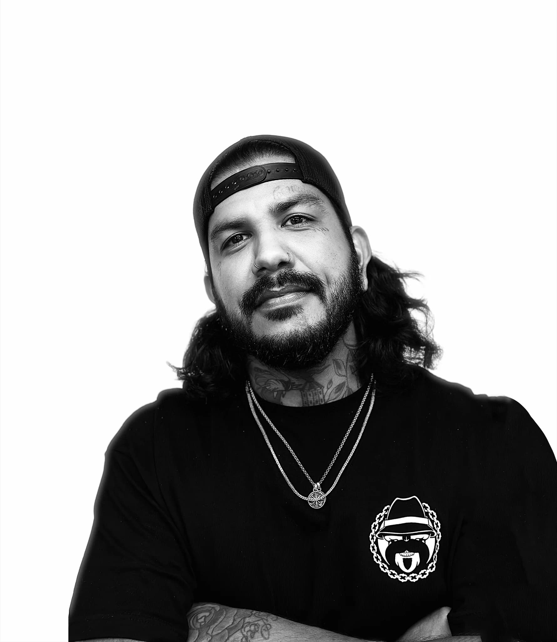 Headshot of Trinidad Duran, barber at The Bureau Barbershop in downtown Salt Lake City.